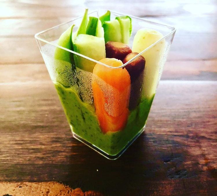 square veggie and green hummus cup