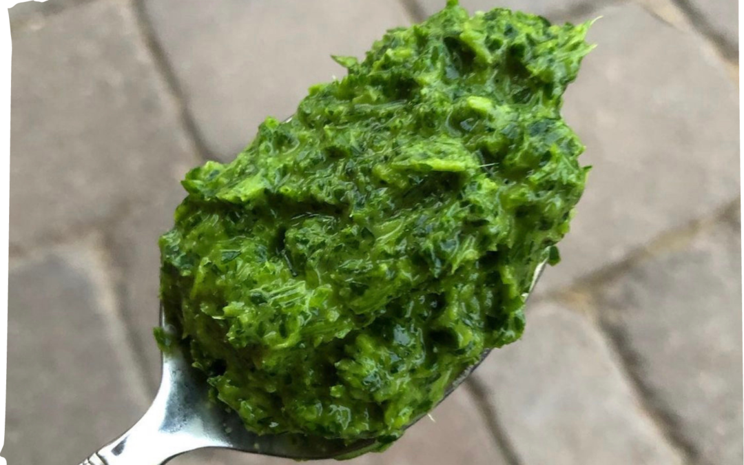 green sparlik on a spoon