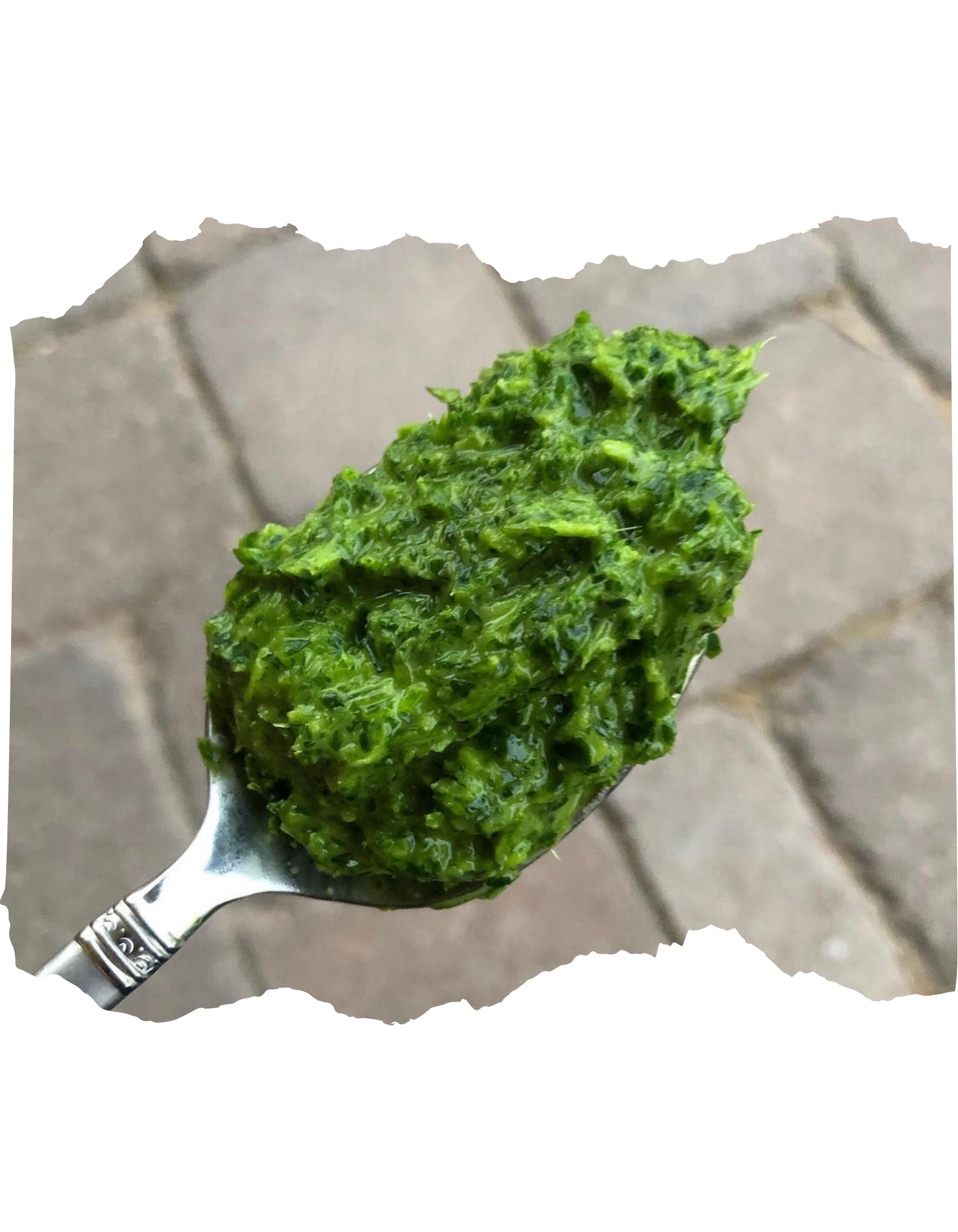 green sparlik on a spoon